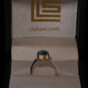 Very rare high grade Bisbee Turquoise contemporary ring with a southwestern kiss